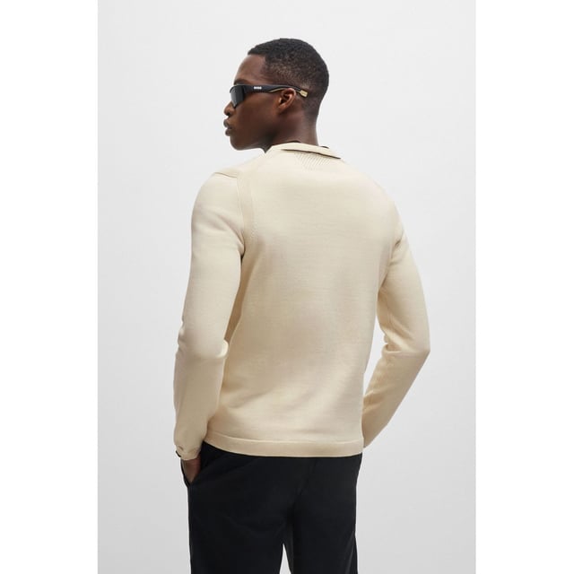 A distinctive sweater by BOSS Menswear. Cut to a regular fit  this top is designed in stretch material with a contrast logo print. This product is partly made with organic cotton. Our organic standards do not allow the use of synthetic fertilisers  pesticides or genetically modified seeds. crewneck - tech-flex cotton stretch knit - contrast HD logo print at left chest tonal to tipping detail - ergonomic moving ribbed seams for comfort and freedom of movement - integrated perforation structure at inner collar  back and underarm for body ventilation