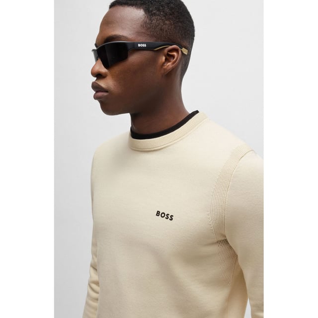 A distinctive sweater by BOSS Menswear. Cut to a regular fit  this top is designed in stretch material with a contrast logo print. This product is partly made with organic cotton. Our organic standards do not allow the use of synthetic fertilisers  pesticides or genetically modified seeds. crewneck - tech-flex cotton stretch knit - contrast HD logo print at left chest tonal to tipping detail - ergonomic moving ribbed seams for comfort and freedom of movement - integrated perforation structure at inner collar  back and underarm for body ventilation