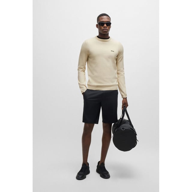 A distinctive sweater by BOSS Menswear. Cut to a regular fit  this top is designed in stretch material with a contrast logo print. This product is partly made with organic cotton. Our organic standards do not allow the use of synthetic fertilisers  pesticides or genetically modified seeds. crewneck - tech-flex cotton stretch knit - contrast HD logo print at left chest tonal to tipping detail - ergonomic moving ribbed seams for comfort and freedom of movement - integrated perforation structure at inner collar  back and underarm for body ventilation