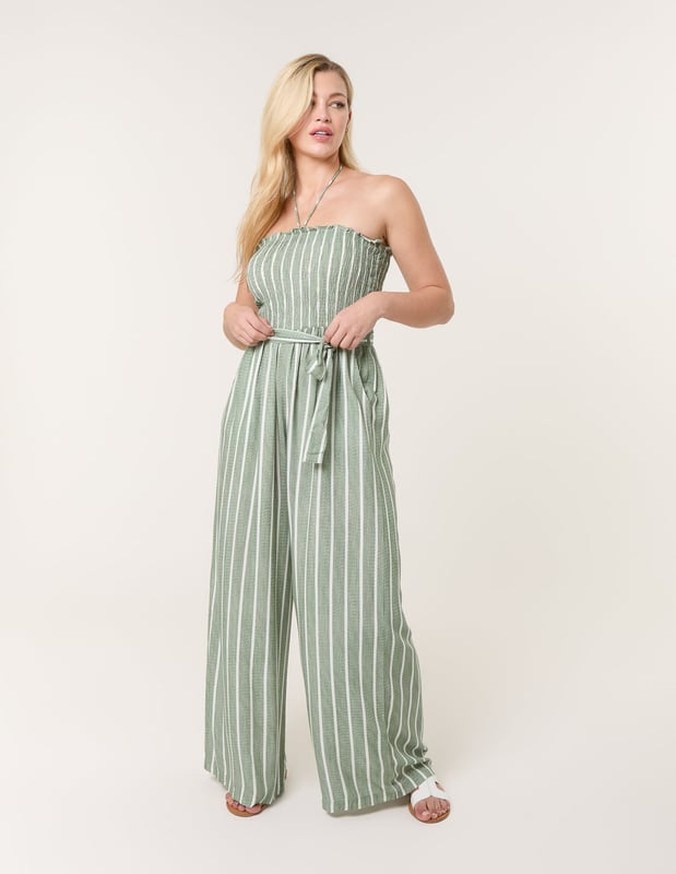 A timeless addition to your wardrobe, perfectly teamed with woven sandals, making this pinstripe jumpsuit a sustainable clothing choice that will stand the test of time.