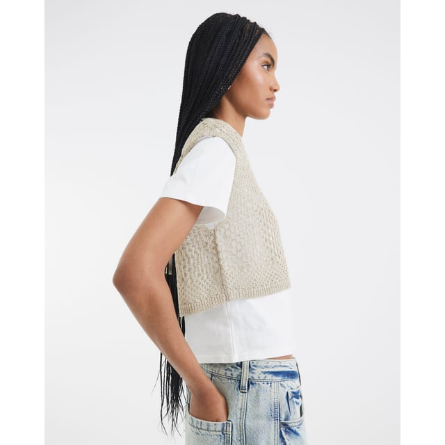 River Island Womens T-shirt Gold Crochet Overlay Crew neckline, Short sleeves, Double layered, Crochet, Tie detailAbout the brandFASHION IS OUR DNARiver Island is an icon of the British high street. Inspired by the latest trends and our heritage style archives, we've been serving style and leading trends for over sixty years.We make fashion for real people with real lives, who want to look real good. Because life's a celebration - let's dress for it.