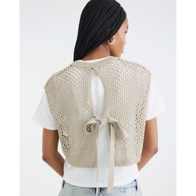 River Island Womens T-shirt Gold Crochet Overlay Crew neckline, Short sleeves, Double layered, Crochet, Tie detailAbout the brandFASHION IS OUR DNARiver Island is an icon of the British high street. Inspired by the latest trends and our heritage style archives, we've been serving style and leading trends for over sixty years.We make fashion for real people with real lives, who want to look real good. Because life's a celebration - let's dress for it.