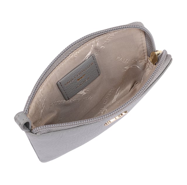 Kara Purse Coin pouch adorned with a sleek brand logo pin on the front, combines functionality with sophisticated style. Made from soft quality leather, it offers a secure and stylish way to keep your coins organized. Presented in a beautiful gift box, it makes a perfect present for any occasion, showcasing both luxury and practicality. D:1.7cm W:14cm H:9.5cm