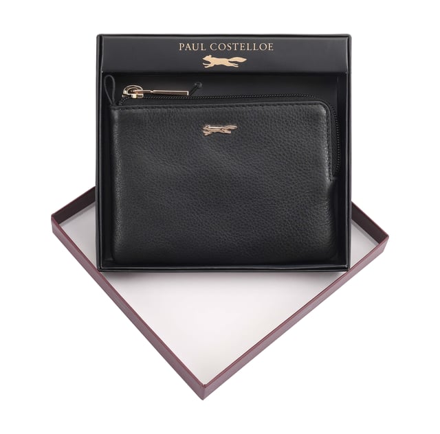 Coin pouch adorned with a sleek brand logo pin on the front, combines functionality with sophisticated style. Made from soft quality leather, it offers a secure and stylish way to keep your coins organized. Presented in a beautiful gift box, it makes a perfect present for any occasion, showcasing both luxury and practicality. D:1.7cm W:14cm H:9.5cm