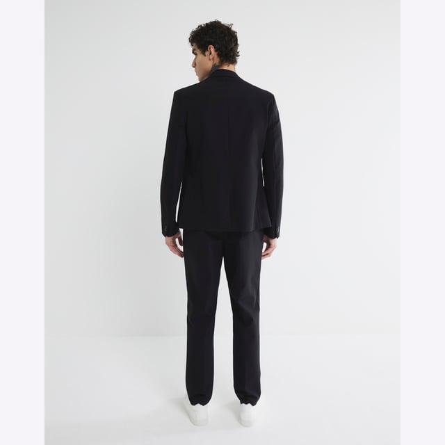 Skinny fit, Side slip pockets, Belt loops, Concealed fastening, Part of a two piece suit, 4 Way stretch, Comfort stretch, Crease resistant, Engineered fitAbout the brandFASHION IS OUR DNARiver Island is an icon of the British high street. Inspired by the latest trends and our heritage style archives, we've been serving style and leading trends for over sixty years.We make fashion for real people with real lives, who want to look real good. Because life's a celebration - let's dress for it.