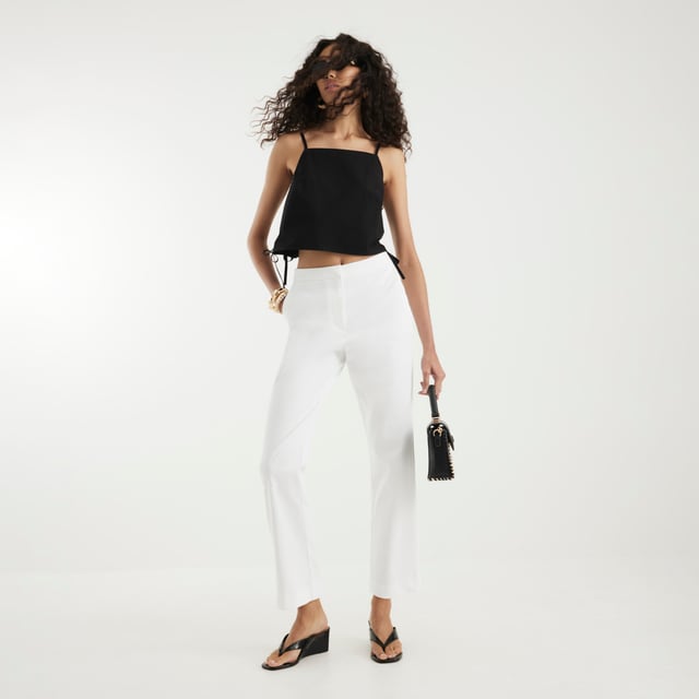 Slim fit, Cropped leg, Side slip pockets, Concealed fastening, TailoredAbout the brandFASHION IS OUR DNARiver Island is an icon of the British high street. Inspired by the latest trends and our heritage style archives, we've been serving style and leading trends for over sixty years.We make fashion for real people with real lives, who want to look real good. Because life's a celebration - let's dress for it.
