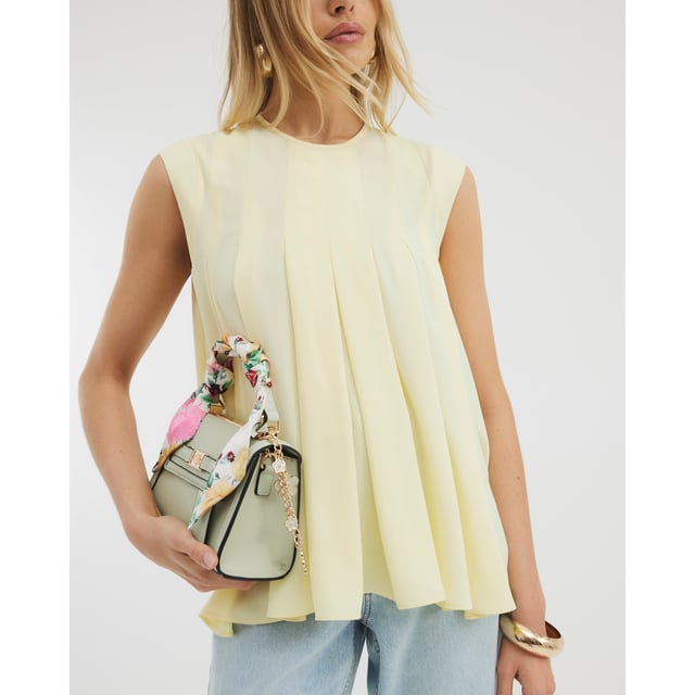 Round neckline, Sleeveless, Pleated, Button fasteningAbout the brandFASHION IS OUR DNARiver Island is an icon of the British high street. Inspired by the latest trends and our heritage style archives, we've been serving style and leading trends for over sixty years.We make fashion for real people with real lives, who want to look real good. Because life's a celebration - let's dress for it.
