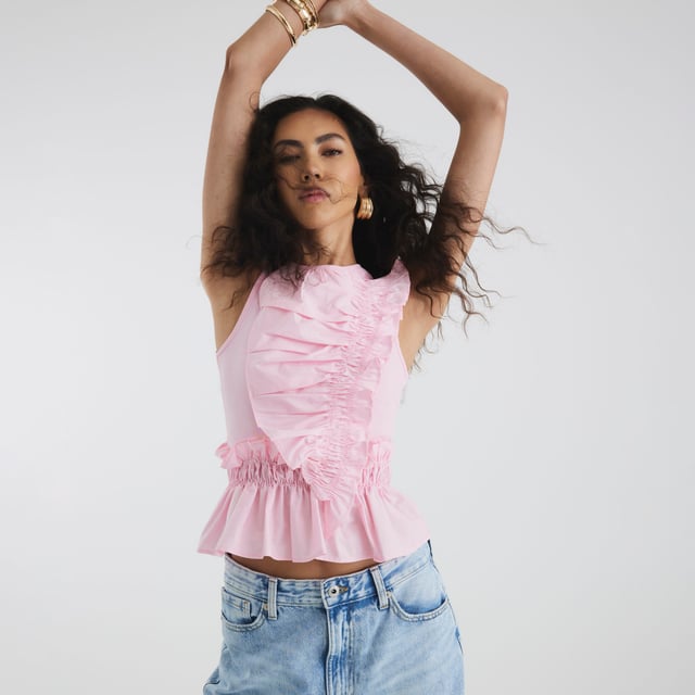 Round neckline, Sleeveless, Frill detailAbout the brandFASHION IS OUR DNARiver Island is an icon of the British high street. Inspired by the latest trends and our heritage style archives, we've been serving style and leading trends for over sixty years.We make fashion for real people with real lives, who want to look real good. Because life's a celebration - let's dress for it.