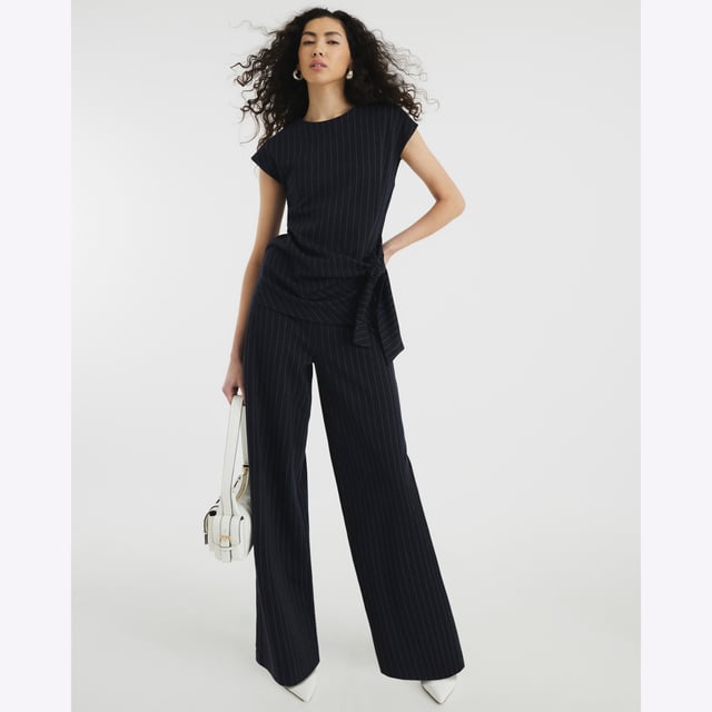 Wide leg, Pinstripe, Drawstring waistbandAbout the brandFASHION IS OUR DNARiver Island is an icon of the British high street. Inspired by the latest trends and our heritage style archives, we've been serving style and leading trends for over sixty years.We make fashion for real people with real lives, who want to look real good. Because life's a celebration - let's dress for it.