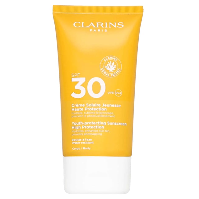 Clarins High Protection Youth-Protecting Sunscreen SPF30 - 150ml Experience ultimate sun protection with Clarins Youth-Protecting Sunscreen SPF30. This 150ml sunscreen features a lightweight, melting texture that effortlessly glides onto your skin, leaving a non-greasy, matte finish. Its advanced water-resistant formula is gentle on the eyes, ensuring comfort while shielding against harmful UVA and UVB rays. Enriched with argan tree extract, it enhances hydration and firms the skin, combating wrinkles effectively. Aloe vera adds an extra layer of soothing moisture. For best results, apply generously and reapply every 2 hours for continuous protection.