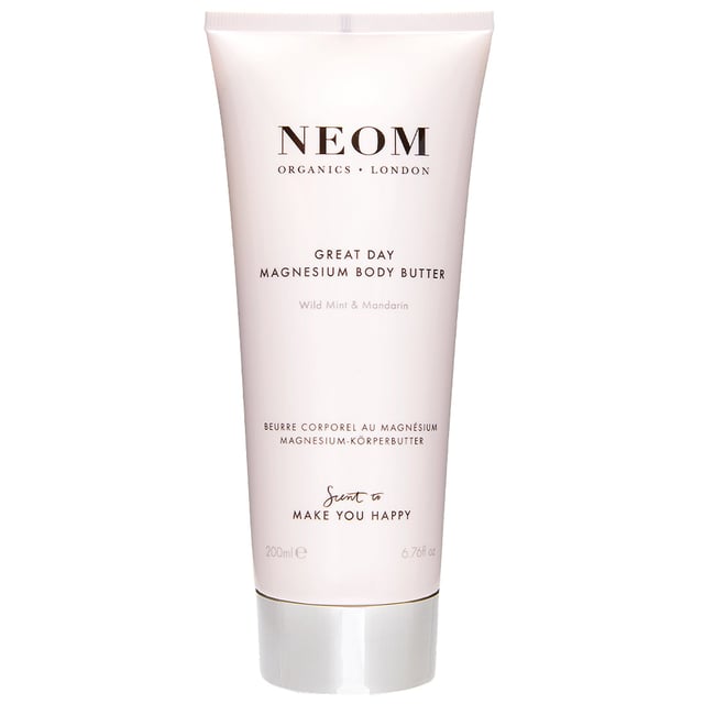 Elevate your daily routine with Neom Wellbeing London's Great Day Magnesium Body Butter, designed to uplift your mood and nourish your skin. Infused with 88mg of magnesium per 5ml, this exceptional body butter supports muscle recovery and overall wellbeing. Enriched with shea butter, mango seed butter, aloe vera, and coconut oil, it deeply moisturizes while providing a refreshing scent of wild mint and mandarin. Perfect for morning use, it revitalizes your senses and is ideal as a post-workout treat. Experience the benefits of 100% natural fragrances with Neom's ethical commitment.