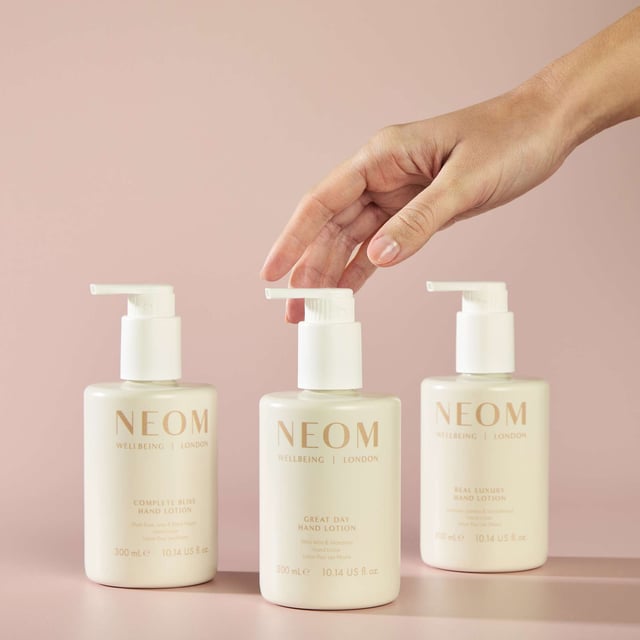 Experience the essence of wellbeing with Neom Wellbeing London's Great Day Hand Lotion, infused with uplifting Wild Mint and Mandarin. This luxurious hand lotion nourishes your skin with rich shea butter and envelops you in a delightful blend of 7 essential oils designed to elevate your mood. Perfect for a refreshing pick-me-up, apply to wet hands and massage for a rejuvenating experience. Neom is a Certified B Corporation, committed to ethical practices that benefit people and the planet.