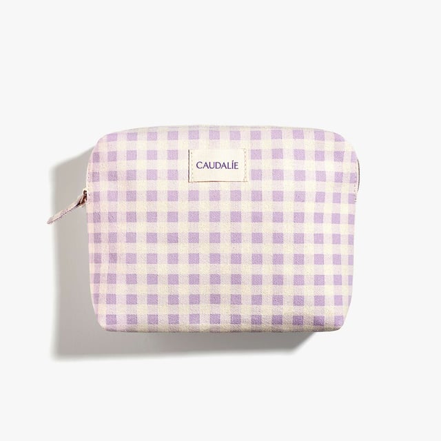 Discover essential skincare for your summer adventures with the Caudalie VinoHydra Summer Travel Skincare Set. This limited edition collection comes in a stylish pouch, perfect for beach trips or city escapes. Inside, you'll find the lightweight Vinoclean Foaming Cleanser (50ml), refreshing Vinohydra Sorbet Moisturiser (15ml), Soleil Des Vignes Shower Gel (30ml), and nourishing Vinotherapist Body Lotion (30ml). Each product cleanses, hydrates, and pampers your skin, while supporting Caudalie's commitment to sustainability.
