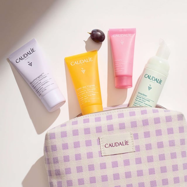 Discover essential skincare for your summer adventures with the Caudalie VinoHydra Summer Travel Skincare Set. This limited edition collection comes in a stylish pouch, perfect for beach trips or city escapes. Inside, you'll find the lightweight Vinoclean Foaming Cleanser (50ml), refreshing Vinohydra Sorbet Moisturiser (15ml), Soleil Des Vignes Shower Gel (30ml), and nourishing Vinotherapist Body Lotion (30ml). Each product cleanses, hydrates, and pampers your skin, while supporting Caudalie's commitment to sustainability.