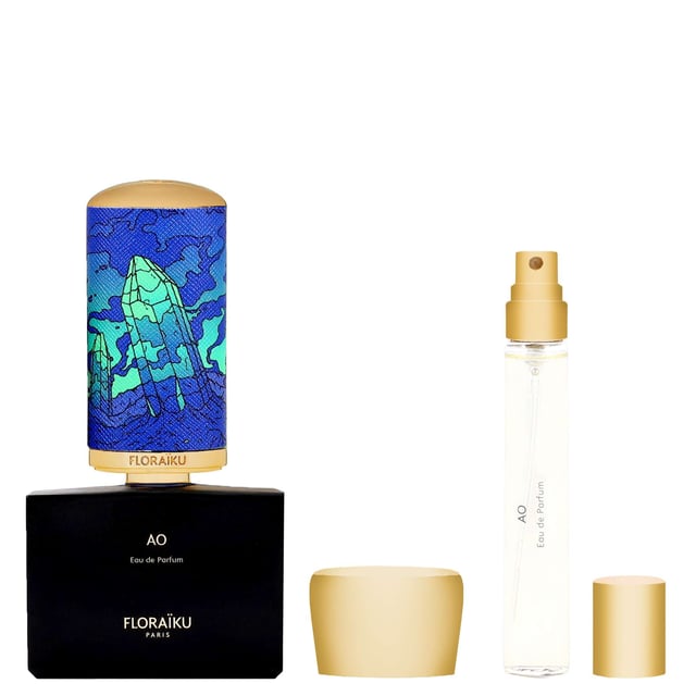 Floraiku AO Eau de Parfum Spray Gift Set - Luxurious Fragrance Collection Discover the enchanting Floraiku AO Eau de Parfum Spray Gift Set, a luxurious fragrance collection that captivates the senses. This exquisite scent blends Tangerine oil, sweet Figs, and balsamic Myrrh oil, creating a fruity fragrance that unfolds beautifully. The top notes feature Blackcurrant, Pink Pepper, and Mandarin, while the heart reveals Fig, Jasmine Sambac, and smoky Incense. The base notes provide warmth with Myrrh, Vetiver, and Tonka Bean. This gift set includes a 50ml and a 10ml Eau de Parfum, along with a stylish travel case, making it a perfect gift for fragrance lovers.
