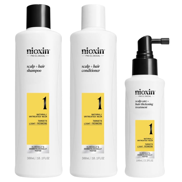 Transform your hair with the Nioxin Pro Clinical System 1 Kit, designed for natural, untreated hair with light thinning. This clinically tested kit includes a 300ml Scalp + Hair Shampoo, a 300ml Scalp + Hair Conditioner, and a 100ml Scalp Care + Hair Thickening Treatment. Experience thicker hair in just 30 days, with 8 out of 10 users reporting visible results. The formula gently cleanses, removes impurities, and minimizes breakage, while botanicals and antioxidants nourish your scalp. Follow our application steps for best results and enjoy beautifully thickened hair.