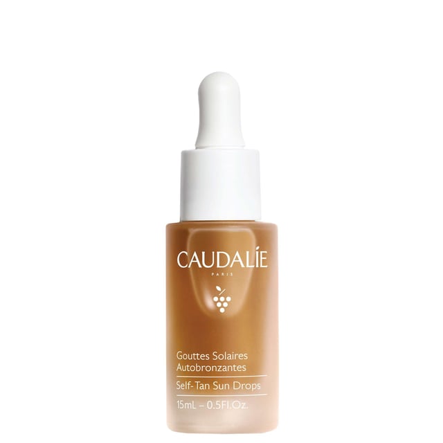Achieve a sun-kissed glow with Caudalie Vinobronze Self-Tan Sun Drops. This innovative formula features natural DHA and erythrulose combined with hydrating organic grape water for a customizable, streak-free tan suitable for all skin types, including sensitive skin. Its non-greasy texture ensures smooth application. Enjoy hydration and a commitment to sustainability while achieving your desired tan. Mix 2-6 drops with your favorite Caudalie cream for a light to deeper tan. Alcohol and fragrance-free for everyday use, join Caudalie's mission to protect the environment.
