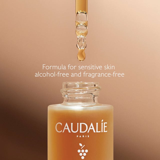 Achieve a sun-kissed glow with Caudalie Vinobronze Self-Tan Sun Drops. This innovative formula features natural DHA and erythrulose combined with hydrating organic grape water for a customizable, streak-free tan suitable for all skin types, including sensitive skin. Its non-greasy texture ensures smooth application. Enjoy hydration and a commitment to sustainability while achieving your desired tan. Mix 2-6 drops with your favorite Caudalie cream for a light to deeper tan. Alcohol and fragrance-free for everyday use, join Caudalie's mission to protect the environment.