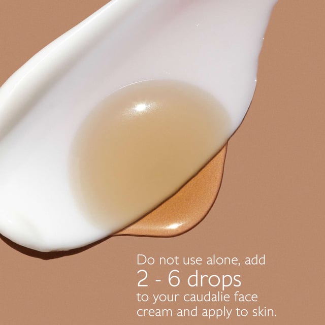 Achieve a sun-kissed glow with Caudalie Vinobronze Self-Tan Sun Drops. This innovative formula features natural DHA and erythrulose combined with hydrating organic grape water for a customizable, streak-free tan suitable for all skin types, including sensitive skin. Its non-greasy texture ensures smooth application. Enjoy hydration and a commitment to sustainability while achieving your desired tan. Mix 2-6 drops with your favorite Caudalie cream for a light to deeper tan. Alcohol and fragrance-free for everyday use, join Caudalie's mission to protect the environment.
