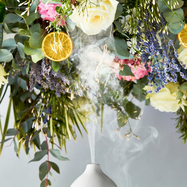 ESPA Aromatherapy Essential Oil Diffuser for Relaxation and Wellness Transform your living space with the ESPA Aromatherapy Essential Oil Diffuser. This stylish diffuser releases a mist of essential oils, enhancing your environment with soothing aromas that promote relaxation and well-being. It works seamlessly with ESPA's Signature Blends, helping you unwind or boost your mood. The ultrasonic technology humidifies the air and disperses fragrant vapor. With customizable light settings, it also serves as a gentle nightlight. To use, fill the water tank, add essential oil, select a misting mode, and enjoy the aromatic experience. (Essential oils sold separately.)