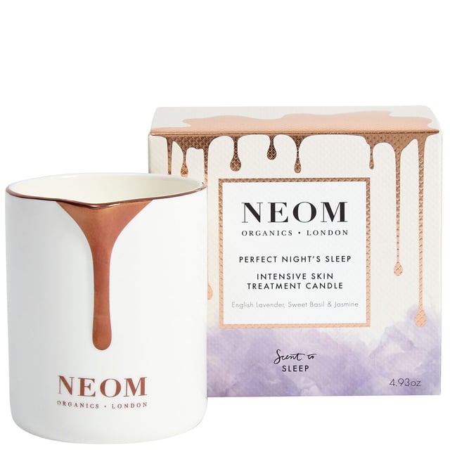 Experience relaxation with Neom Wellbeing London's Scent to Sleep Intensive Skin Treatment Candle. This candle blends 19 pure essential oils, including calming lavender and soothing chamomile, creating a tranquil atmosphere for restful sleep. Infused with baobab and jojoba oil, it hydrates and rejuvenates your skin. Light it and pour the luxurious oils onto your body for an indulgent experience. Neom is a Certified B Corporation, committed to high social and environmental standards. Enjoy the serene benefits and transform your evening routine.