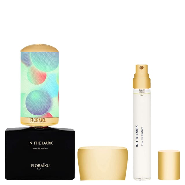 Discover the enchanting Floraiku In The Dark Eau de Parfum Gift Set, featuring a 50ml and a 10ml bottle of this mesmerizing fragrance. "In the Dark" captivates the senses with its sparkling notes of bergamot, lemon, and sweet orange, complemented by refreshing peppermint. The heart reveals a luxurious blend of Turkish rose absolute and clove leaf essence, while the base notes of patchouli, olibanum, cedarwood, and incense provide a warm finish. This exquisite set includes a stylish travel case, perfect for elegance on-the-go.