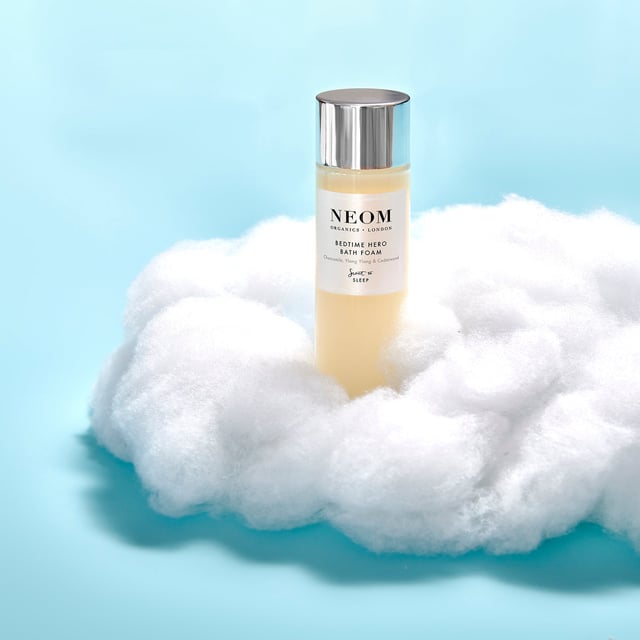 Experience the transformative power of Neom Wellbeing London Scent To Sleep Bedtime Hero Bath Foam, designed to enhance relaxation and promote restful sleep. This luxurious bath foam features a blend of 11 essential oils, including calming English lavender and soothing chamomile. Infused with nourishing marshmallow, coconut oil, sweet almond, and aloe, it softens your skin. Pour a capful under running water, soak for at least 10 minutes, and enjoy the calming scents. Ideal for creating a pre-sleep sanctuary, Neom is a Certified B Corporation committed to ethical practices and sustainability.