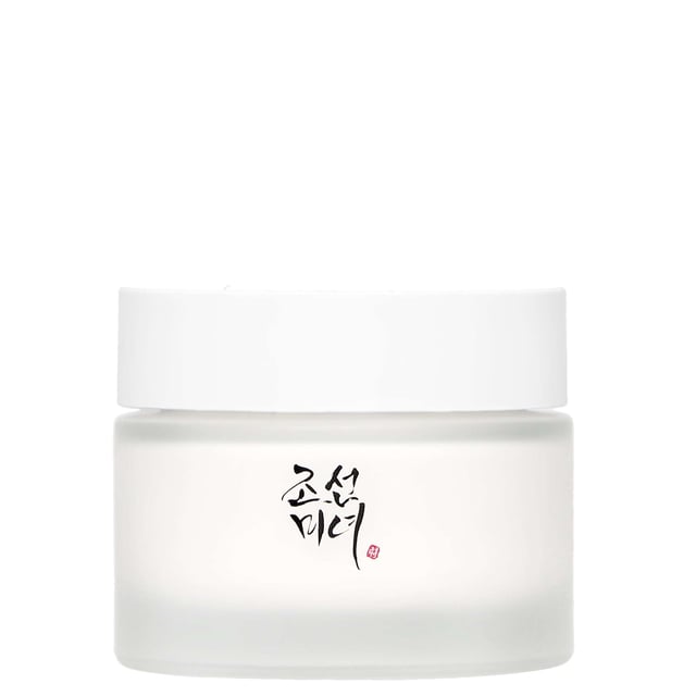 Discover the Beauty of Joseon Dynasty Cream, a luxurious 50ml moisturizer designed to deliver intense hydration and nourishment for all skin types, particularly dry skin. This multi-functional cream features a rich texture and is infused with powerful ingredients including Rice Bran Water, Ginseng Water, Squalane, and Niacinamide. It absorbs quickly into the skin, providing a radiant, healthy glow while effectively balancing oil and moisture levels. Experience the benefits of this cruelty-free cream, which not only protects your skin but also enhances its overall health and appearance.