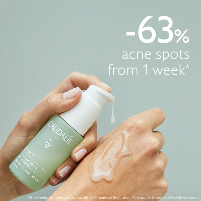 Experience clear, radiant skin with Caudalie Vinopure Blemish Control Salicylic Acid Serum. This natural solution is specially formulated for acne-prone skin, reducing redness and blemishes. Clinical tests show that 63% of users noticed a significant decrease in acne spots within just one week. Infused with 100% natural salicylic acid sourced from wintergreen leaves, it gently exfoliates and unclogs pores, while niacinamide soothes irritation and redness. Enriched with organic rose water and purifying essential oils, this serum effectively controls sebum production and fights acne bacteria. With a lightweight gel texture, it absorbs quickly for a shine-free finish, making it suitable for even the most sensitive skin. Non-comedogenic and vegan, this serum is your go-to for a clearer complexion. For optimal results, pair it with our Purifying Gel Cleanser, Purifying Toner, and Moisturising Mattifying Fluid. Join Caudalie in our commitment to the planet, as we contribute 1% of our turnover to environmental protection efforts.