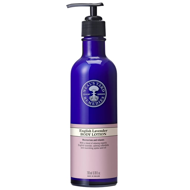 Indulge your skin with Neal's Yard Remedies Organic English Lavender Body Lotion, a luxurious blend enriched with organic lavender. This hydrating lotion combines almond, jojoba, and hemp oils, along with calming calendula, leaving your skin velvety soft and beautifully scented. Sourced from a family farm in Hampshire, our lavender offers a gentle fragrance that soothes the senses. Perfect for all skin types and suitable for vegans, this lotion is ideal for daily use. Simply massage a small amount into your arms and body after bathing for optimal hydration.