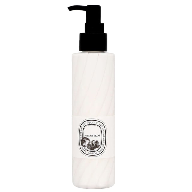 Indulge your skin with Diptyque Philosykos Hand and Body Lotion, a luxurious formula designed to deeply nourish and hydrate. This rich lotion envelops your skin in the fresh and captivating scent of fig trees, featuring a harmonious blend of fig leaves, sap, and wood, complemented by a subtle touch of black pepper. Experience silky smooth skin with every application. Simply massage into your hands and body until fully absorbed for a revitalizing and fragrant experience.