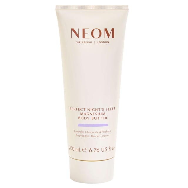 Experience ultimate relaxation with Neom Wellbeing London's Scent To Sleep Magnesium Body Butter. This luxurious body butter is formulated with 100% natural ingredients, including nourishing shea butter and coconut oil. Infused with calming lavender, soothing chamomile, and grounding patchouli, it helps you unwind and prepare for sleep. With magnesium to support wellbeing, this body butter moisturizes, aids stress relief, and promotes better sleep quality. Simply massage onto your body for a restful experience. Trust Neom, a Certified B Corporation committed to ethical practices.