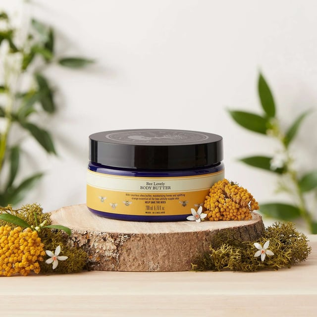 Indulge your skin with Neal's Yard Remedies Bee Lovely Body Butter, an intensely hydrating moisturizer made from rich shea butter and organic honey from Mexico. Infused with zesty Italian and Mexican oranges, this luxurious body butter leaves your skin feeling soft, smooth, and rejuvenated. Suitable for ages 3 and up, apply after bathing and massage gently for best results. Since 1981, Neal's Yard Remedies has focused on sustainability, ensuring all products are cruelty-free, vegetarian, and made with ethically sourced ingredients.