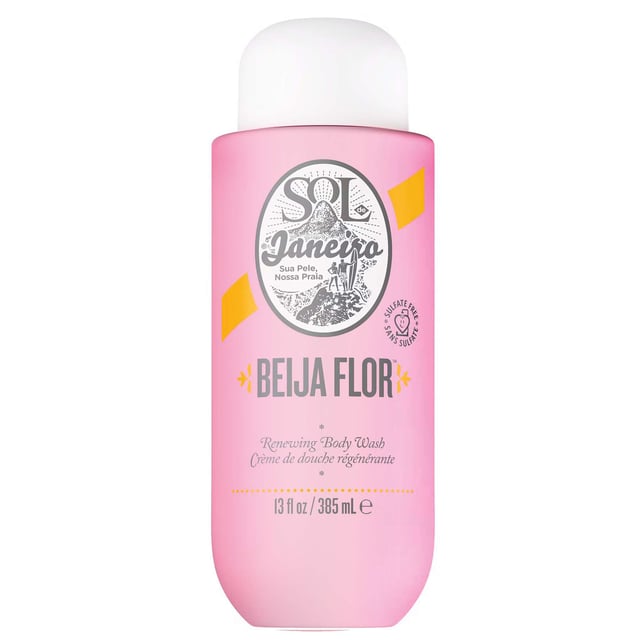 Experience the rejuvenating power of Sol de Janeiro's Beija Flor Body Wash, crafted to replenish and renew your skin. This luxurious formula supports cellular renewal while providing essential moisture, thanks to its blend of gentle retinol alternative and vegan squalane. Enjoy smooth, supple skin with every wash. Infused with the enchanting scents of Brazilian jasmine and pink dragonfruit, this body wash transforms your shower into a fragrant oasis. Ideal for daily use, it complements collagen-boosting treatments and is suitable for vegans. To use, apply to wet skin, massage, then rinse.