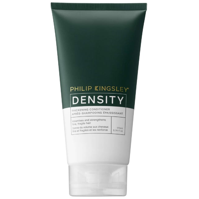 Transform your fine hair with Philip Kingsley's Density Thickening Conditioner. This advanced formula volumizes and enhances hair texture with hyper-branched polymers and Hydrolyzed Pea Peptides, increasing strand thickness while hydrating your hair. Infused with biomimetic ceramides, it repairs damaged cuticles and improves resilience. Enjoy shinier, glossier hair with reduced breakage. Ideal for regular use, apply to mid-lengths and ends after shampooing, then rinse thoroughly. Choose eco-friendly packaging made from sugarcane bioplastic and recycled materials.