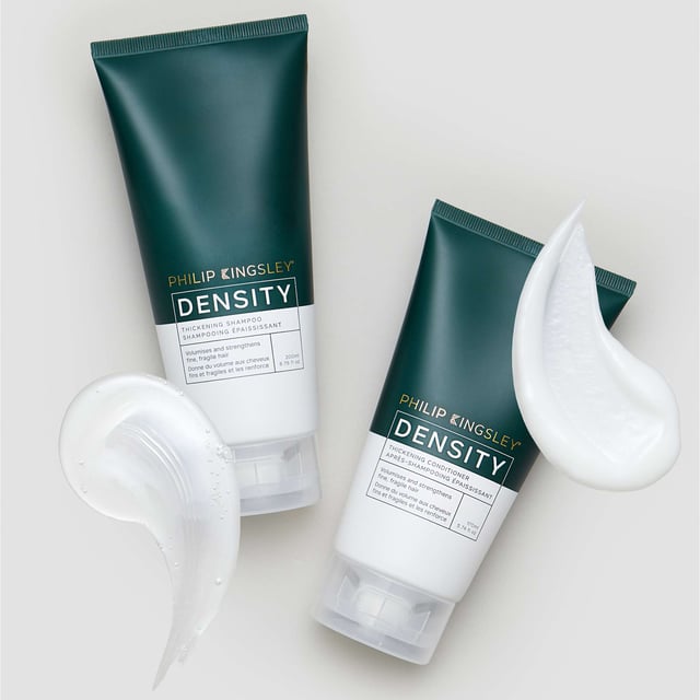 Transform your fine hair with Philip Kingsley's Density Thickening Conditioner. This advanced formula volumizes and enhances hair texture with hyper-branched polymers and Hydrolyzed Pea Peptides, increasing strand thickness while hydrating your hair. Infused with biomimetic ceramides, it repairs damaged cuticles and improves resilience. Enjoy shinier, glossier hair with reduced breakage. Ideal for regular use, apply to mid-lengths and ends after shampooing, then rinse thoroughly. Choose eco-friendly packaging made from sugarcane bioplastic and recycled materials.