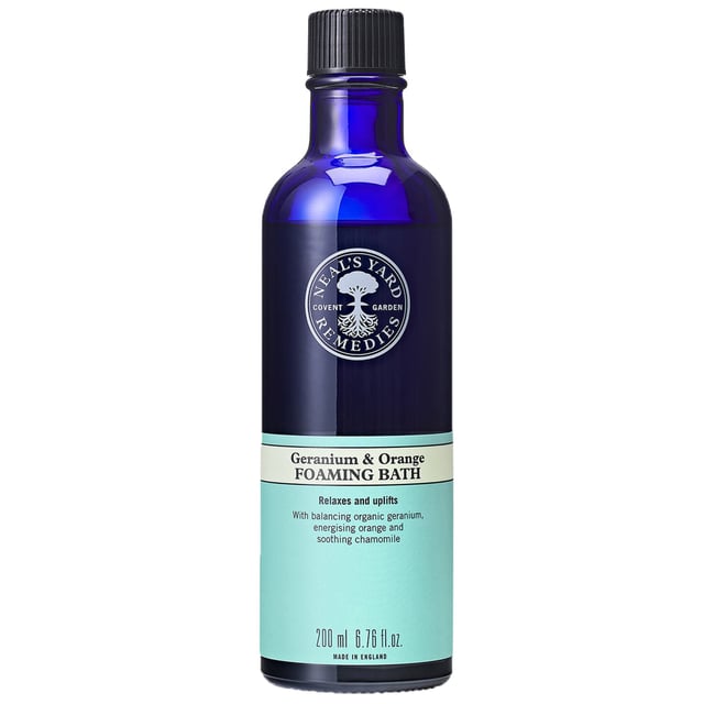 Transform your bathing experience with Neal's Yard Remedies Geranium & Orange Foaming Bath. This luxurious foaming bath combines organic geranium, invigorating orange, and calming chamomile to relax your body and mind. Enjoy the uplifting aroma that promotes calm and wellbeing. Perfect for vegans, simply pour under warm running water, swirl, and immerse in the soothing scent. For enhanced relaxation, follow with our Geranium & Orange Body Balm. Neal's Yard Remedies has been committed to sustainability and ethical practices since 1981.