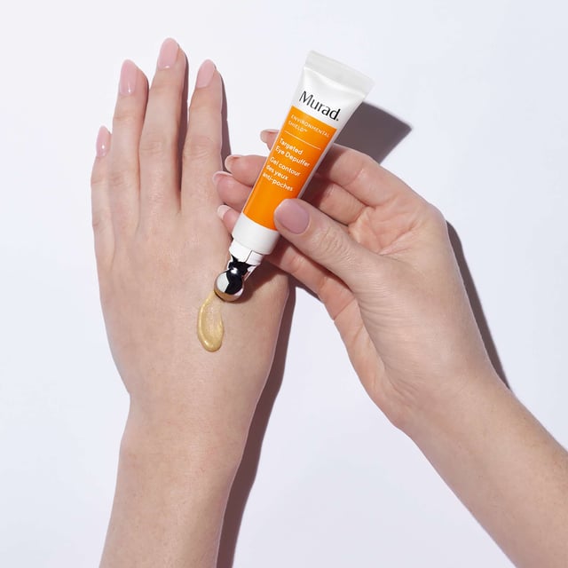 Revitalize your eyes with Murad's Targeted Eye Depuffer Serum, designed to visibly reduce puffiness and firm the skin around the eyes. This innovative microcurrent-inspired treatment provides an instant awakening effect, tightening and smoothing with regular use. To achieve the best results, start by massaging the Essential-C Cleanser over a damp face and closed eyes. After rinsing, apply a small amount of the Targeted Eye Depuffer around the eyes using the cooling applicator tip. Follow up with your favorite Murad moisturizer and sunscreen for all-day protection.