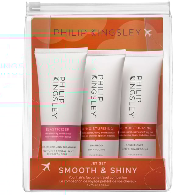 Transform your haircare routine with the Philip Kingsley Jet Set Smooth and Shiny Set, specifically designed for on-the-go hair care. This essential trio is perfect for managing curly, frizzy hair, ensuring your locks are softened, smoothed, and shining bright. Each product works in harmony to reduce frizz, deeply condition, and eliminate bad hair days. The set includes: 1. Philip Kingsley Re-Moisturizing Shampoo (75ml) - Cleanses and boosts hydration, making hair manageable. 2. Philip Kingsley Re-Moisturizing Conditioner (75ml) - Seals cuticles and enhances shine. 3. Philip Kingsley Elasticizer (75ml) - An award-winning pre-shampoo mask that nourishes and strengthens all hair types. Perfect for beginners or anyone looking to elevate their hair care game. Eco-friendly packaging made from renewable and recycled materials.