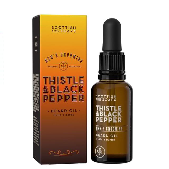 Elevate your grooming routine with the Scottish Fine Soaps Thistle & Black Pepper Beard Oil. This premium beard oil combines soothing almond oil, hydrating jojoba oil, shaping avocado oil, and vitamin E to keep your beard looking its best. Infused with a distinctive thistle and black pepper fragrance, this oil offers a unique Scottish twist on a classic men's grooming staple. The enriching Milk Thistle extract adds a rich, woody amber scent with citrus and herbal notes. Simply drop a few drops into your palm and massage evenly throughout your beard for a well-groomed look.