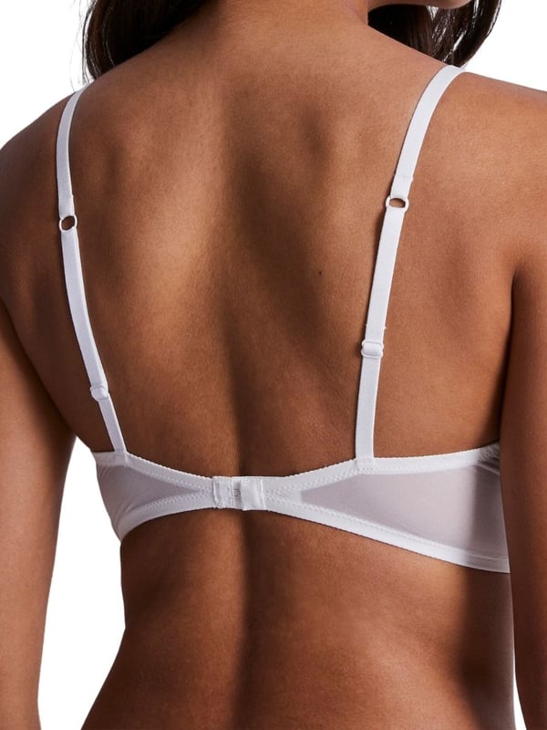 Aubade Kiss Of Love Triangle Bralette. Plunge non-wired bralette with lacey soft cups and matching briefs avaible. The product is hand-wash only.