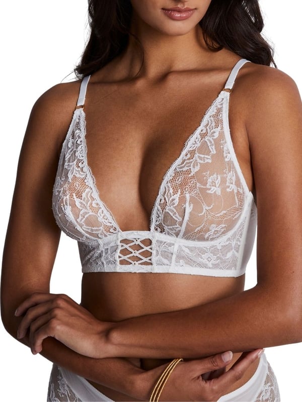 Aubade Kiss Of Love Triangle Bralette. Plunge non-wired bralette with lacey soft cups and matching briefs avaible. The product is hand-wash only.