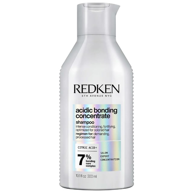 Discover the power of Redken Acidic Bonding Concentrate Shampoo, the ultimate solution for all hair types. This rich shampoo deeply conditions while reducing breakage and protecting hair color from fading. Infused with Citric Acid, it strengthens hair bonds and enhances resilience after coloring. Formulated with a pH-balancing formula, it defends against damage from heat styling and chemical treatments. Experience healthy-looking hair that feels revitalized. For the best results, pair with Acidic Bonding Concentrate Conditioner for a complete hair care regimen.