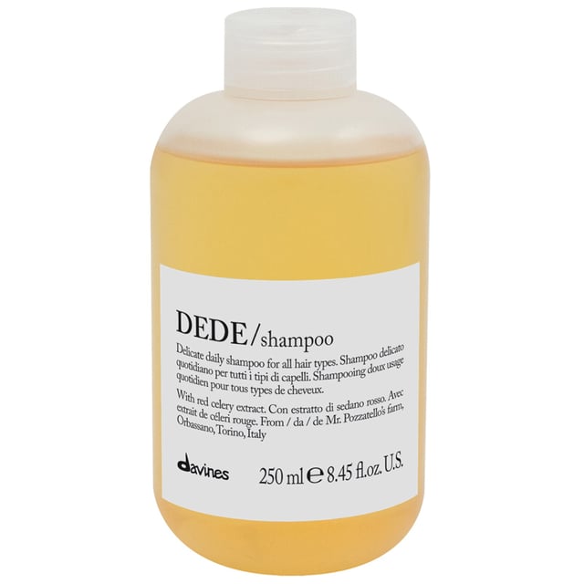 Experience the nourishing power of Davines DEDE Shampoo, designed for medium fine and fine hair types. This lightweight shampoo creates a delicate foam that cleanses your hair while leaving it light, shiny, and manageable. Enriched with natural ingredients and Orbassano Red Celery extract, known for its re-mineralising properties, this shampoo hydrates and enhances your hair's natural beauty. Eco-friendly packaging and produced with 100% clean energy, it cares for both your hair and the environment. For best results, apply to wet hair, massage gently, and rinse.