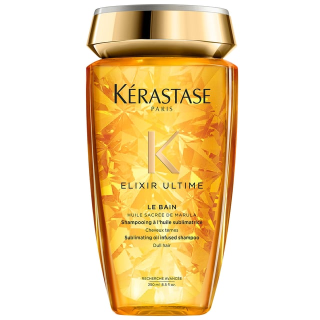 Transform your blonde hair with Kérastase Blond Absolu Bain Ultra-Violet, the anti-brass purple shampoo. It neutralizes unwanted brassiness and yellow tones, ideal for cool blondes and grey hair. Regular use provides long-lasting protection against brassiness while revitalizing shine and softness. Infused with Hyaluronic Acid and Edelweiss flower, it boosts luminosity and nourishes hair. For best results, apply to wet hair, massage, and leave for 2 to 5 minutes before rinsing.