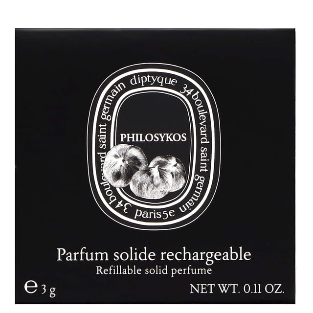 Experience the essence of a sun-soaked Greek summer with Diptyque Philosykos Refillable Solid Perfume. This captivating fragrance celebrates the fig tree, blending fresh fig leaves and ripe figs at the top with a heart enriched by green notes and creamy coconut. The scent evolves into a warm base of fig tree, cedar, and woody undertones, creating a harmonious and refreshing aroma. Perfect for on-the-go application, this solid perfume is a luxurious addition to your fragrance collection, allowing you to indulge in the beauty of nature wherever you are.