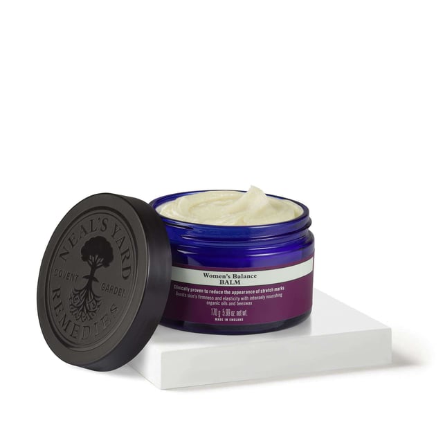 Discover the power of Neal's Yard Remedies Women's Balance Balm, a luxurious 170g aromatherapeutic balm designed to visibly reduce the appearance of stretch marks from growth spurts and weight changes. This clinically proven formula enhances skin firmness and elasticity, enriched with organic oils like sweet almond and macadamia oil. Experience deep nourishment while calming your mind with a soothing blend of patchouli, geranium, rose, and frankincense. Join the movement towards sustainable beauty with Neal's Yard Remedies, a pioneer in organic health and beauty since 1981.
