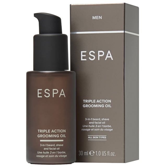 Transform your grooming routine with ESPA Men's Triple Action Grooming Oil, a versatile 3-in-1 product designed for shaving, beard care, and facial hydration. This nourishing oil ensures a close shave while conditioning your facial hair for a smooth finish. Enriched with lipids and vitamins, it hydrates and protects your skin, while botanical extracts soothe and rejuvenate. Suitable for all skin types, it calms dehydrated skin and leaves facial hair looking healthy and well-groomed. The eco-friendly packaging includes a recyclable glass bottle with a matte black pump, made from 30% recycled glass. To use, simply massage a few drops into your skin before shaving or apply to your beard for a polished look.