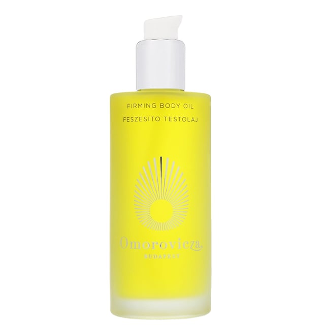 Experience the luxurious Omorovicza Firming Body Oil, an aromatic blend designed to tone and refine your skin. This exceptional body oil minimizes the appearance of stretch marks while deeply hydrating and restoring elasticity. Infused with plum almond oil for enhanced suppleness, vitamin A and apricot kernel oil for a soft touch, and calendula oil for skin restoration, it also features vitamin E to support collagen production and protect against free radicals. Perfect for vegans and suitable for sensitive, dry, oily, and combination skin types. Free from parabens, silicones, and artificial additives, this body oil promises a radiant, healthy glow. To use, simply massage a small amount into your skin or apply to hair for added shine.