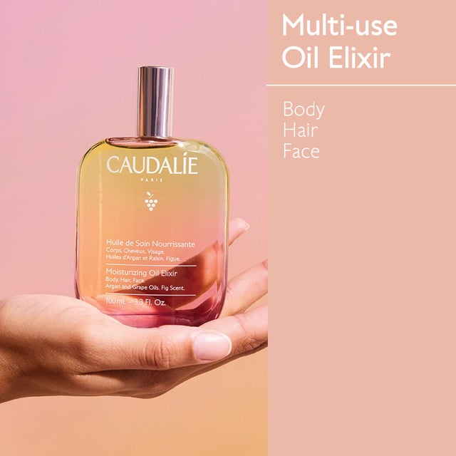 Experience the luxurious Caudalie Moisturizing Oil Elixir, a blend of precious oils that hydrates your skin while enveloping you in the fragrance of fresh figs. This innovative dry oil is enriched with prickly pear extract and grape seed oil, delivering intense moisture and antioxidants. Enjoy the captivating scent of green fig and cedar wood, leaving your skin soft and glowing. Perfect for all skin types, this vegan formula can be used on your body, hair, and face for a non-greasy finish. Join Caudalie's commitment to sustainability, contributing to environmental protection.